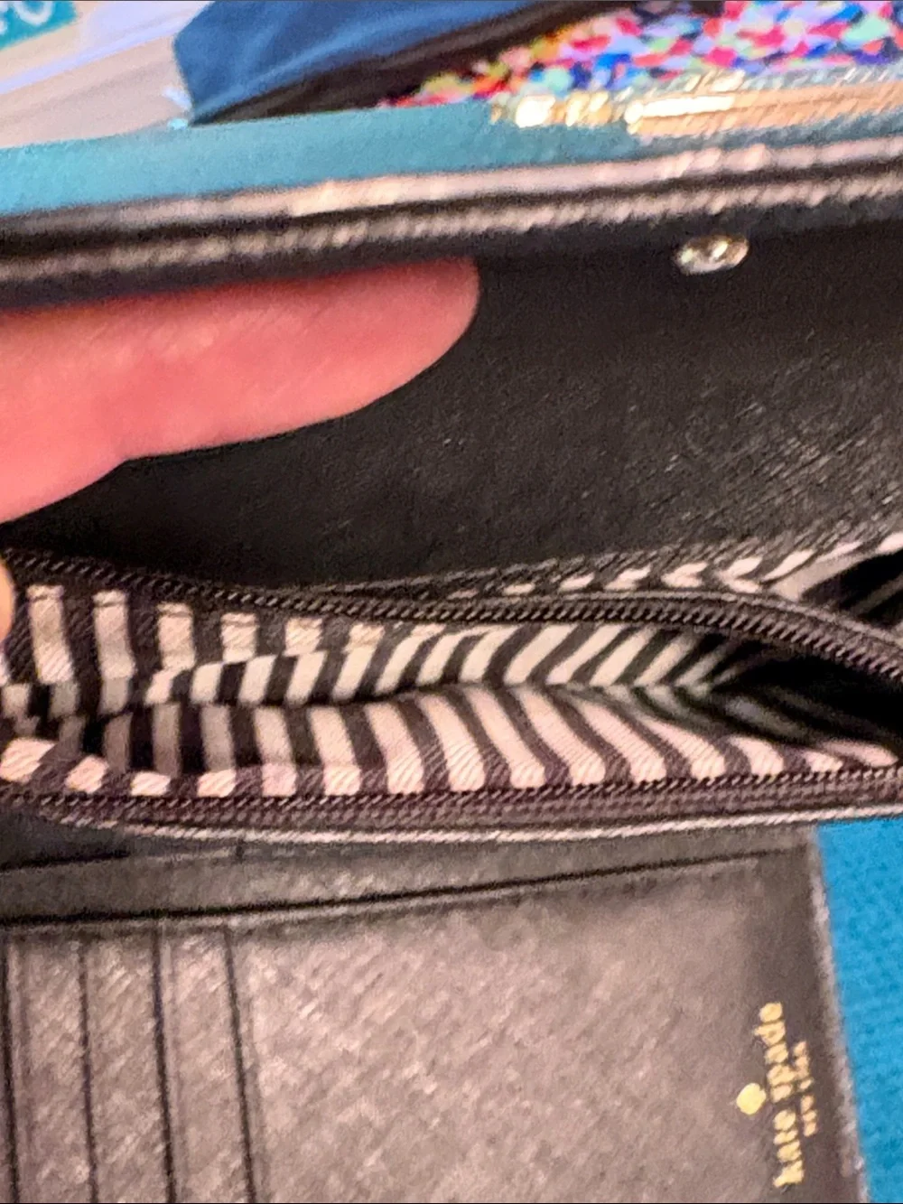 Kate Spade black saffiano tri-fold hand wallet with gold logo